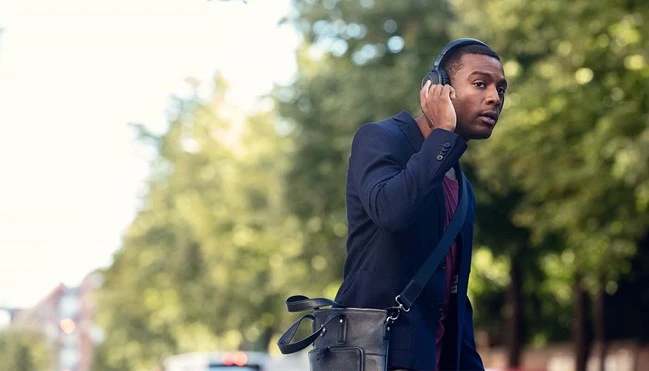 adapt-600---man-on-the-go-with-headset-on