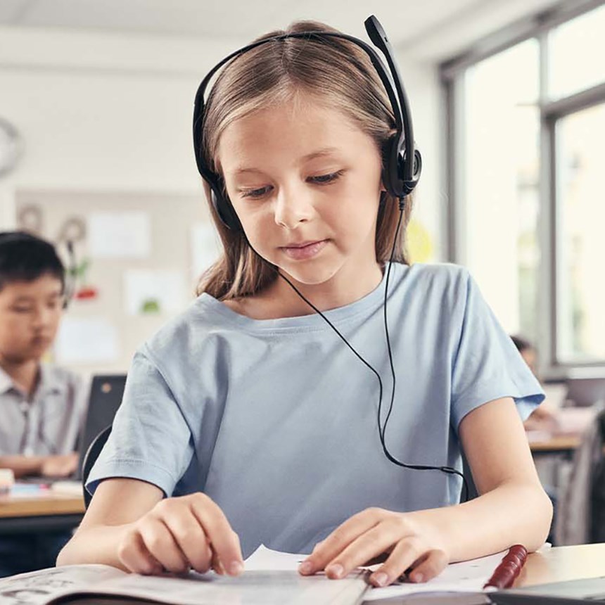 edu-10---girl-at-school-wearing-headset